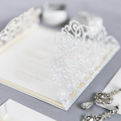 Close up of silver glitter wedding card